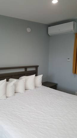 Imagen de la habitación del Hotel The Palms On Ocean. Foto 3