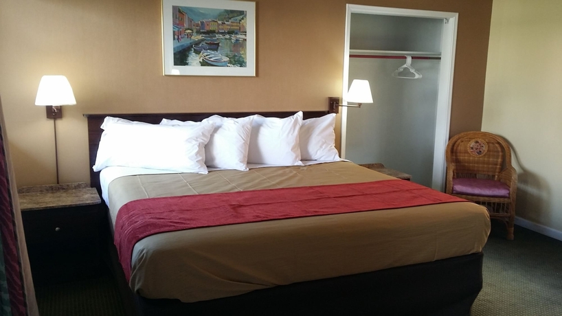 Imagen de la habitación del Hotel The Palms On Ocean. Foto 6
