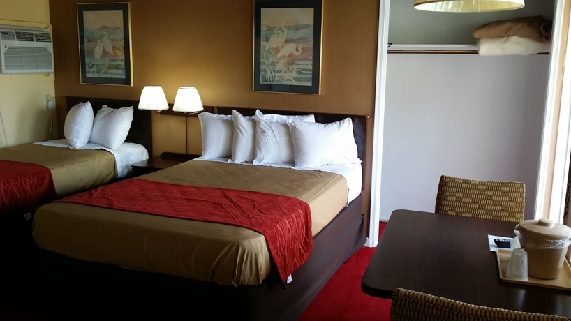 Imagen de la habitación del Hotel The Palms On Ocean. Foto 13