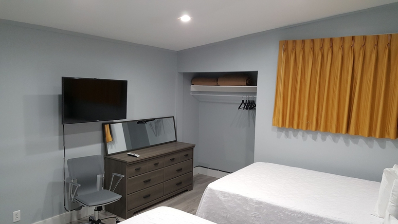 Imagen de la habitación del Hotel The Palms On Ocean. Foto 15