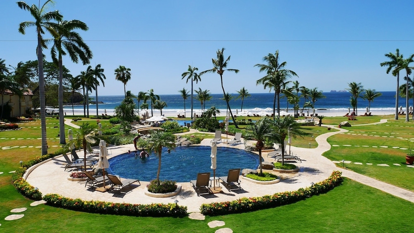 Imagen de la piscina del Hotel The Palms Playa Flamingo. Foto 17