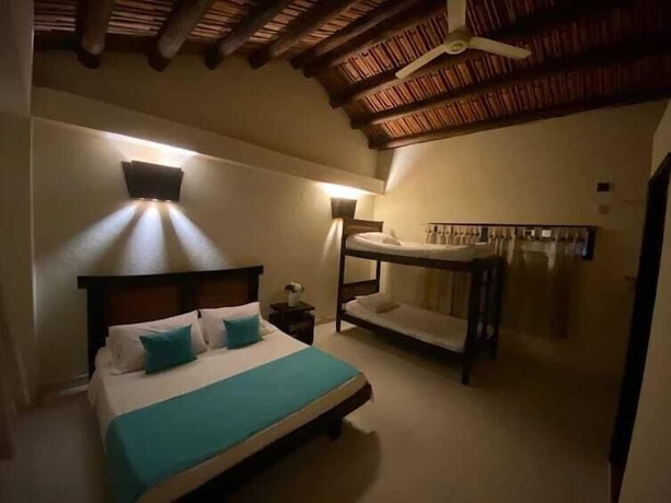 Imagen de la habitación del Hotel The Palms Resort, Melgar. Foto 10
