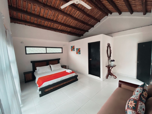 Imagen de la habitación del Hotel The Palms Resort, Melgar. Foto 11