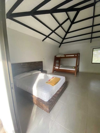 Imagen de la habitación del Hotel The Palms Resort, Melgar. Foto 12