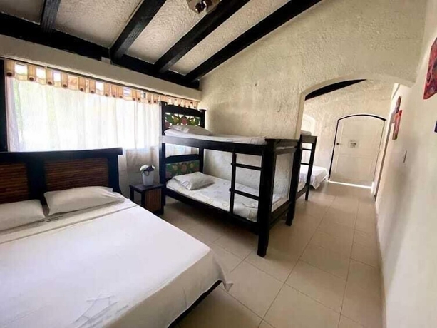Imagen de la habitación del Hotel The Palms Resort, Melgar. Foto 13