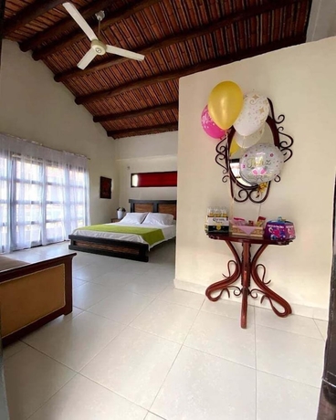 Imagen de la habitación del Hotel The Palms Resort, Melgar. Foto 14