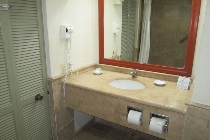 Imagen de la habitación del Hotel The Palms Resort Of Mazatlan. Foto 9