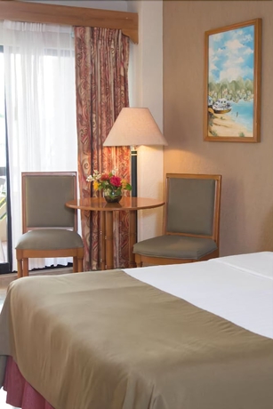 Imagen de la habitación del Hotel The Palms Resort Of Mazatlan. Foto 14