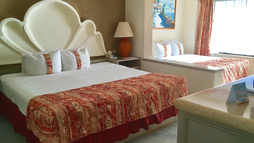 Imagen de la habitación del Hotel The Palms Resort Of Mazatlan. Foto 15