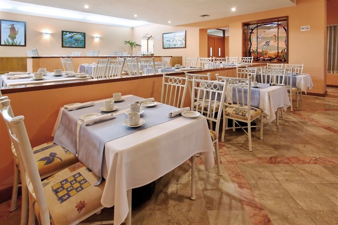 Imagen del bar/restaurante del Hotel The Palms Resort Of Mazatlan. Foto 4