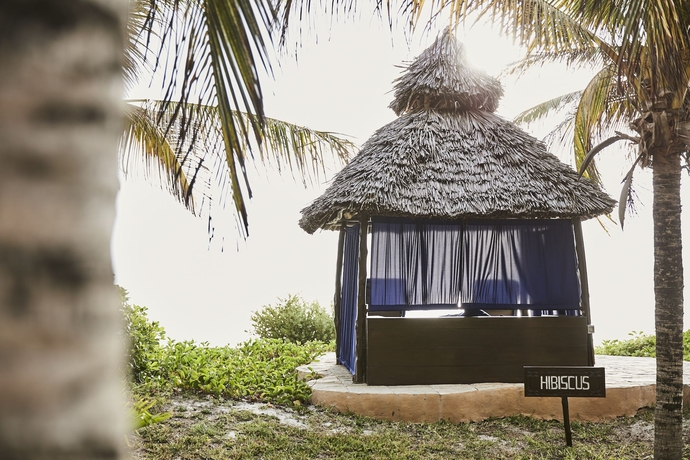 Imagen de la habitación del Hotel The Palms Zanzibar - All Inclusive. Foto 13