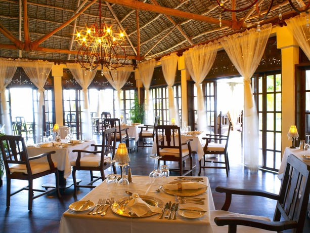 Imagen del bar/restaurante del Hotel The Palms Zanzibar - All Inclusive. Foto 4