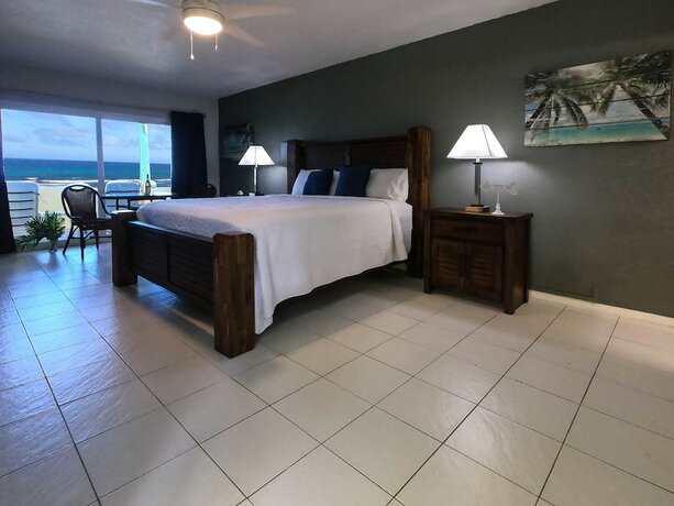 Imagen de la habitación del Hotel The Palms at Pelican Cove. Foto 16