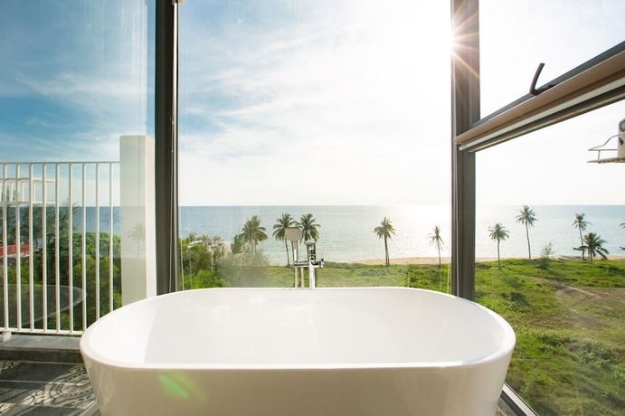 Imagen de la habitación del Hotel The Palmy Luxury Beach Phu Quoc. Foto 1