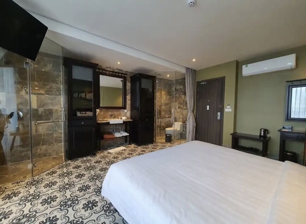 Imagen de la habitación del Hotel The Palmy Luxury Beach Phu Quoc. Foto 4