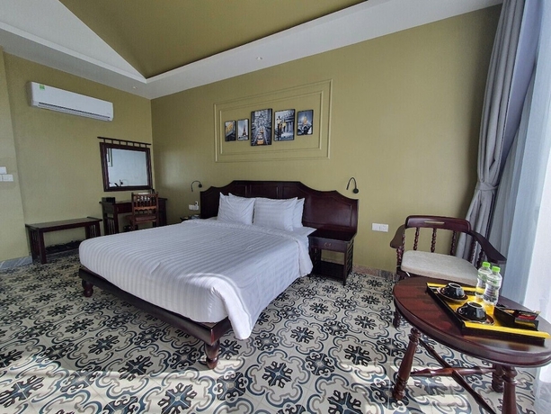 Imagen de la habitación del Hotel The Palmy Luxury Beach Phu Quoc. Foto 5