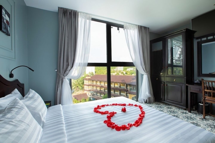 Imagen de la habitación del Hotel The Palmy Luxury Beach Phu Quoc. Foto 7