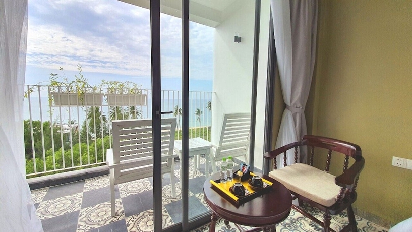 Imagen de la habitación del Hotel The Palmy Luxury Beach Phu Quoc. Foto 13