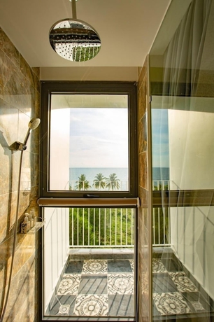 Imagen de la habitación del Hotel The Palmy Luxury Beach Phu Quoc. Foto 15