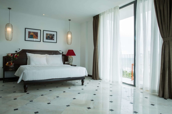 Imagen de la habitación del Hotel The Palmy Resort Phu Quoc and Spa. Foto 13