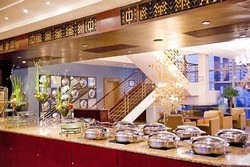 Imagen del bar/restaurante del Hotel The Panorama Hotel On The Bund. Foto 2