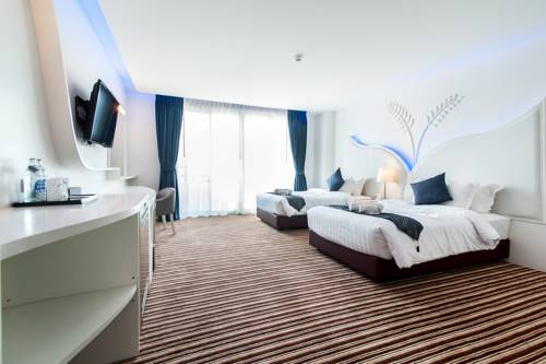 Imagen de la habitación del Hotel The Paradiso Jk Design. Foto 12