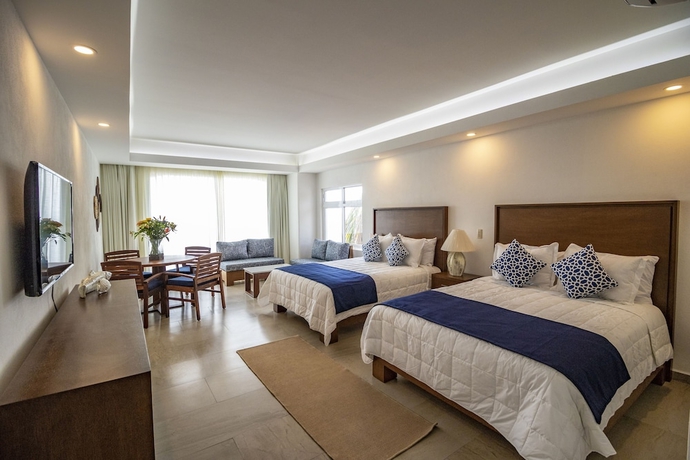 Imagen de la habitación del Hotel The Paramar Beachfront Boutique With Breakfast Included - Downtown Malecon. Foto 5