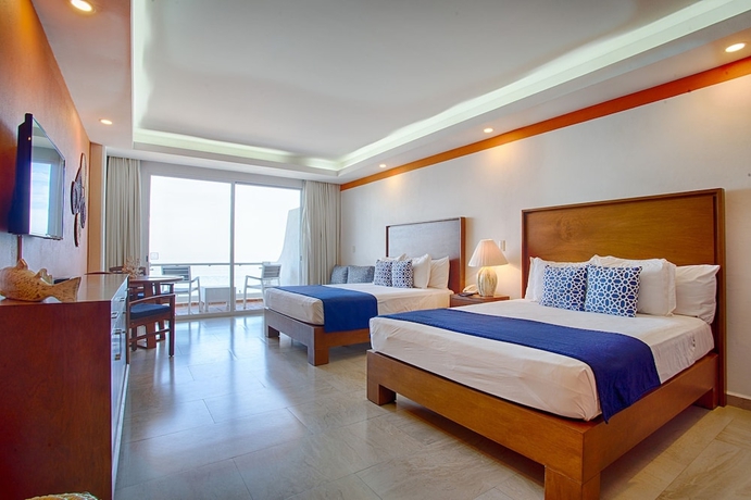 Imagen de la habitación del Hotel The Paramar Beachfront Boutique With Breakfast Included - Downtown Malecon. Foto 12