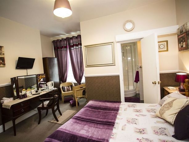 Imagen de la habitación del Hotel The Parasol Weston. Foto 16