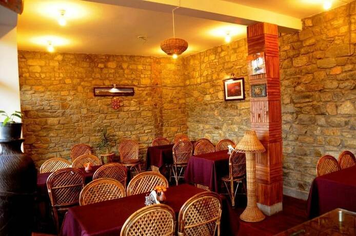 Imagen del bar/restaurante del Hotel The Parijat Retreat. Foto 14