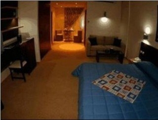 Imagen de la habitación del Hotel The Parisian. Foto 10