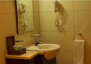 Imagen de la habitación del Hotel The Parisian. Foto 11