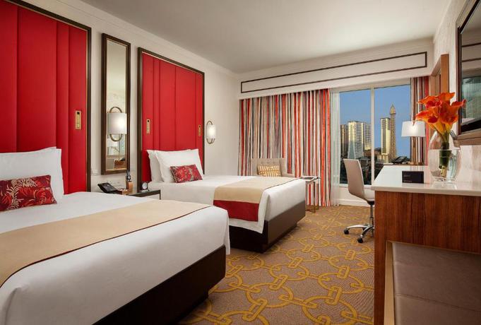 Imagen de la habitación del Hotel The Parisian Macao. Foto 16
