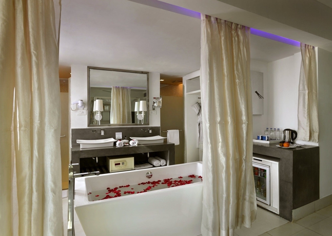 Imagen de la habitación del Hotel The Park Calangute Goa. Foto 7