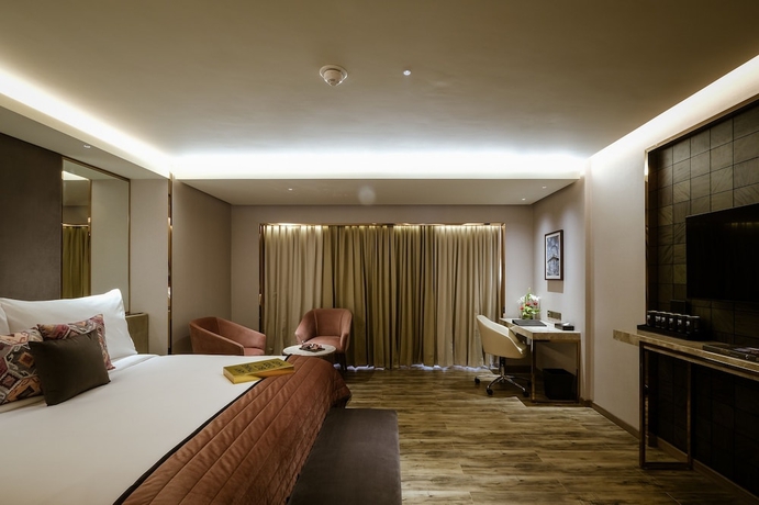 Imagen de la habitación del Hotel The Park Indore. Foto 3