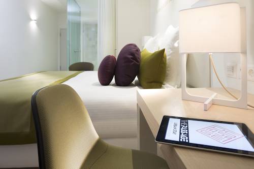 Imagen de la habitación del Hotel The Passage. Foto 2