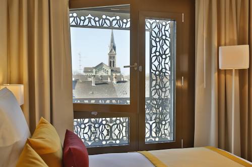 Imagen de la habitación del Hotel The Passage. Foto 6