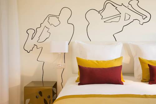 Imagen de la habitación del Hotel The Passage. Foto 7