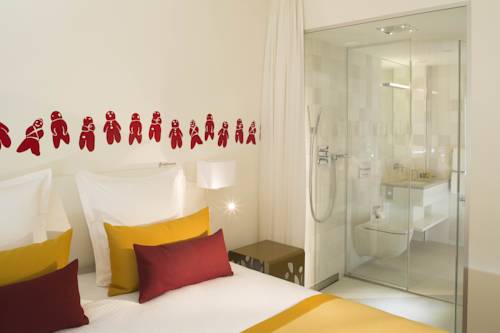 Imagen de la habitación del Hotel The Passage. Foto 8