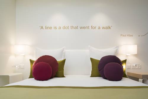 Imagen de la habitación del Hotel The Passage. Foto 14