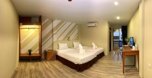 Imagen de la habitación del Hotel The Pat. Foto 9