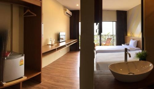 Imagen de la habitación del Hotel The Pat. Foto 10