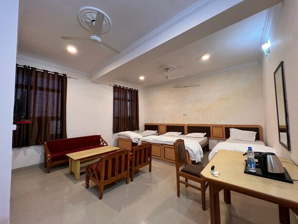 Imagen de la habitación del Hotel The Patel Stadium. Foto 17