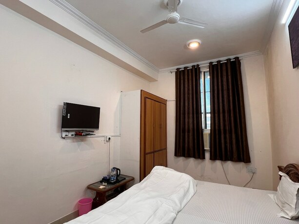 Imagen de la habitación del Hotel The Patel Stadium. Foto 19