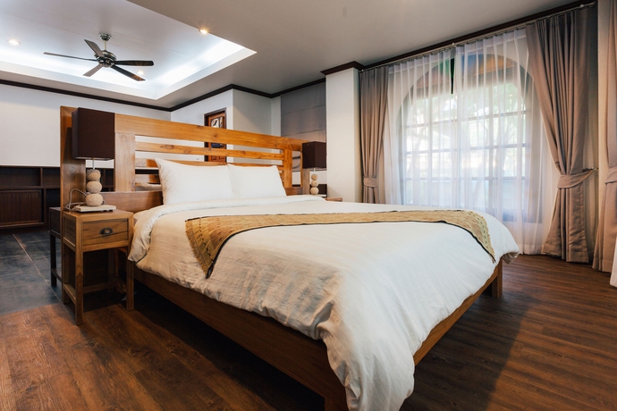 Imagen de la habitación del Hotel The Pavana Chiang Mai Resort. Foto 8