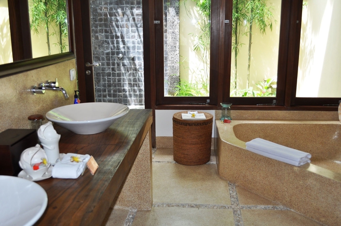 Imagen de la habitación del Hotel The Pavilions Bali. Foto 9