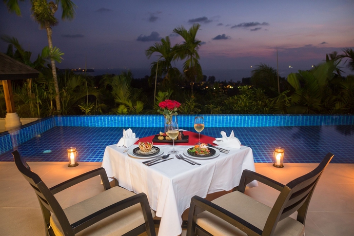 Imagen del bar/restaurante del Hotel The Pavilions Phuket. Foto 2