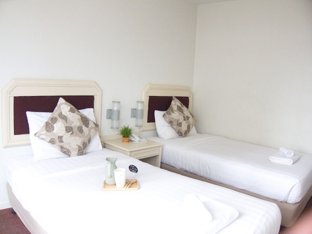 Imagen de la habitación del Hotel The Pawin. Foto 5