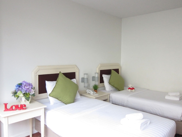 Imagen de la habitación del Hotel The Pawin. Foto 8