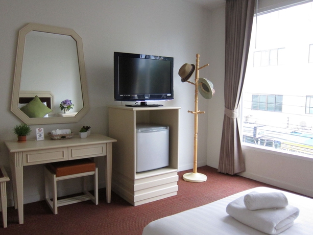 Imagen de la habitación del Hotel The Pawin. Foto 10
